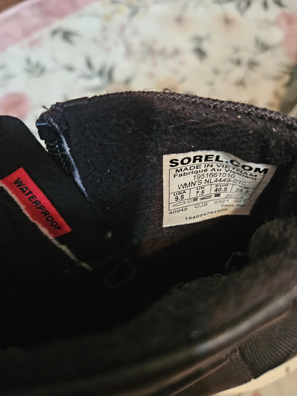 Sorel Black and White Slip-On Zip Ankle Boots for Women